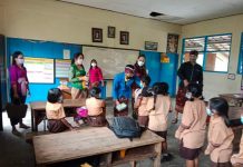 Ajak Masyarakat Tetap Lakukan Prokes, Dosen dan Mahasiswa FH Undwi Denpasar Edukasi Melalui Giat Pengabdian Kepada Masyarakat